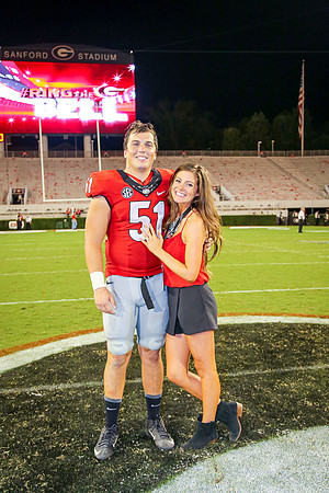 Jake's Proposal to Peyton After the Game by Blane Marable Photog
