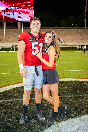 Jake's Proposal to Peyton After the Game by Blane Marable Photog
