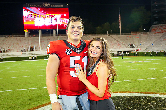 Jake's Proposal to Peyton After the Game by Blane Marable Photog