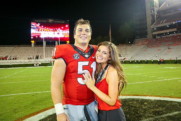 Jake's Proposal to Peyton After the Game by Blane Marable Photog