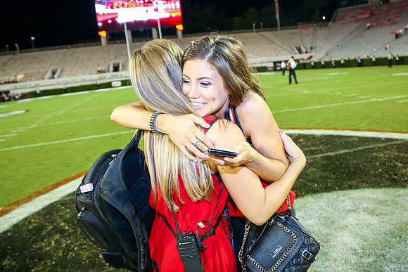 Jake's Proposal to Peyton After the Game by Blane Marable Photog