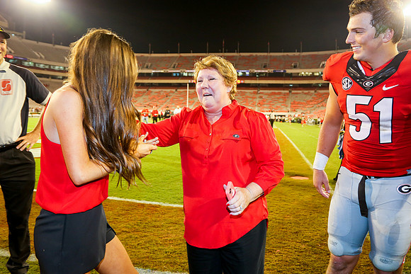Jake's Proposal to Peyton After the Game by Blane Marable Photog