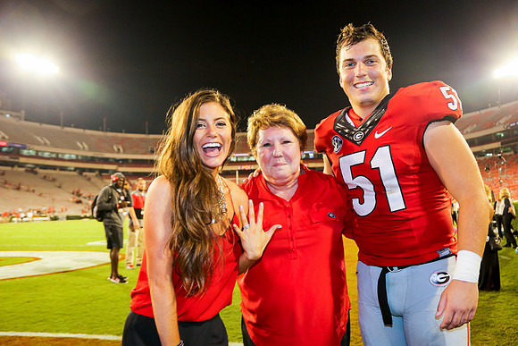 Jake's Proposal to Peyton After the Game by Blane Marable Photog
