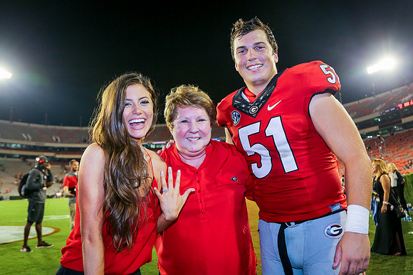 Jake's Proposal to Peyton After the Game by Blane Marable Photog