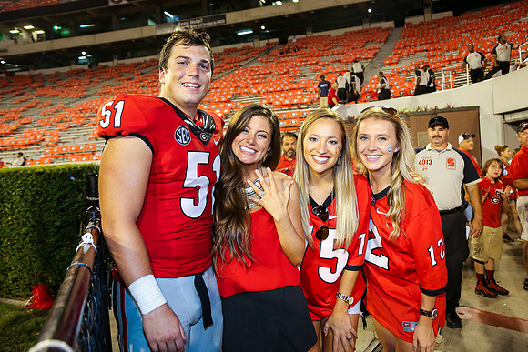Jake's Proposal to Peyton After the Game by Blane Marable Photog