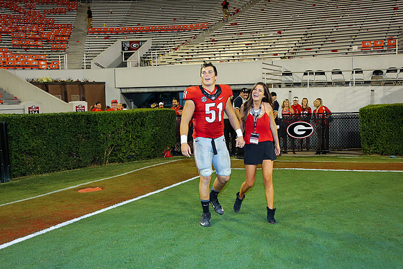 Jake's Proposal to Peyton After the Game by Blane Marable Photog