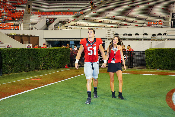 Jake's Proposal to Peyton After the Game by Blane Marable Photog