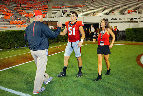 Jake's Proposal to Peyton After the Game by Blane Marable Photog