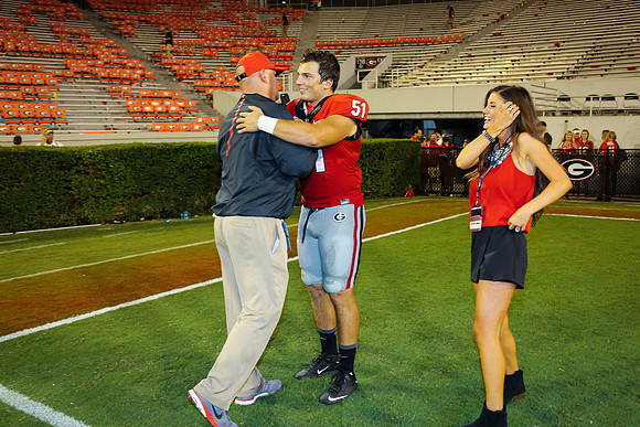 Jake's Proposal to Peyton After the Game by Blane Marable Photog