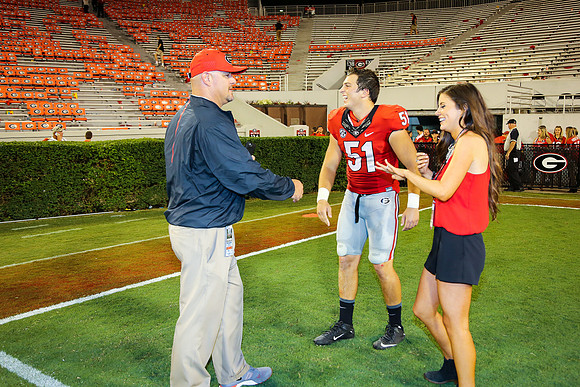 Jake's Proposal to Peyton After the Game by Blane Marable Photog