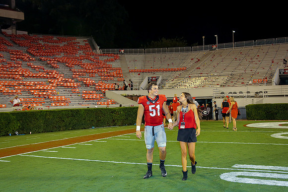 Jake's Proposal to Peyton After the Game by Blane Marable Photog