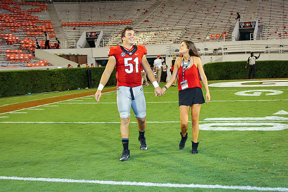 Jake's Proposal to Peyton After the Game by Blane Marable Photog