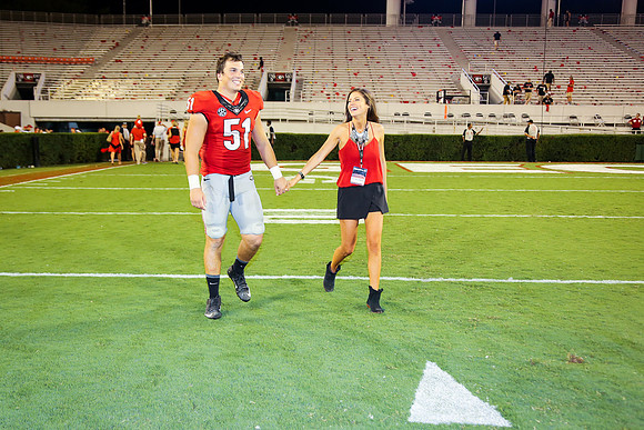Jake's Proposal to Peyton After the Game by Blane Marable Photog