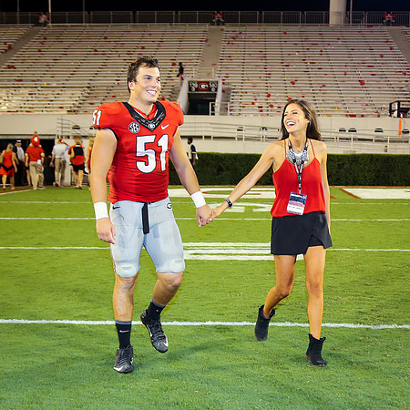 Jake's Proposal to Peyton After the Game by Blane Marable Photog