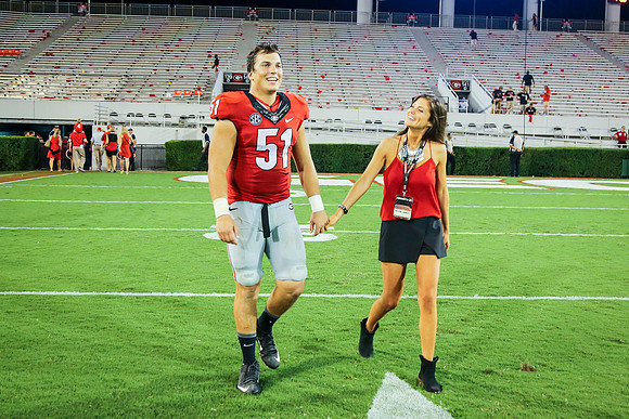 Jake's Proposal to Peyton After the Game by Blane Marable Photog
