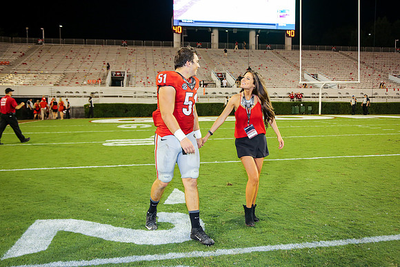 Jake's Proposal to Peyton After the Game by Blane Marable Photog