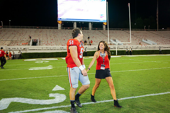 Jake's Proposal to Peyton After the Game by Blane Marable Photog