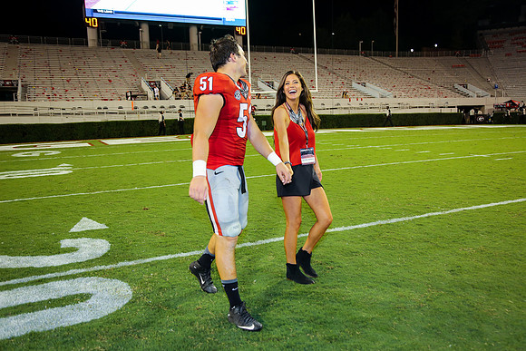 Jake's Proposal to Peyton After the Game by Blane Marable Photog