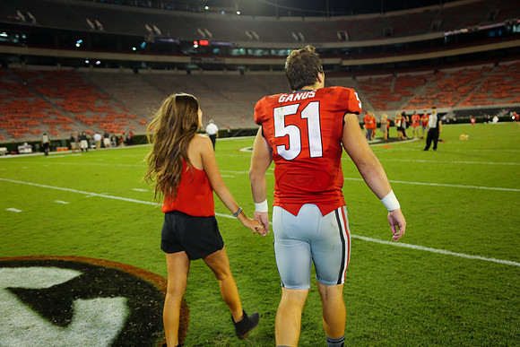Jake's Proposal to Peyton After the Game by Blane Marable Photog