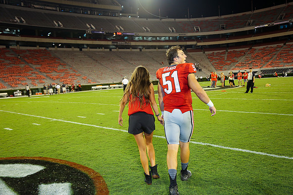 Jake's Proposal to Peyton After the Game by Blane Marable Photog