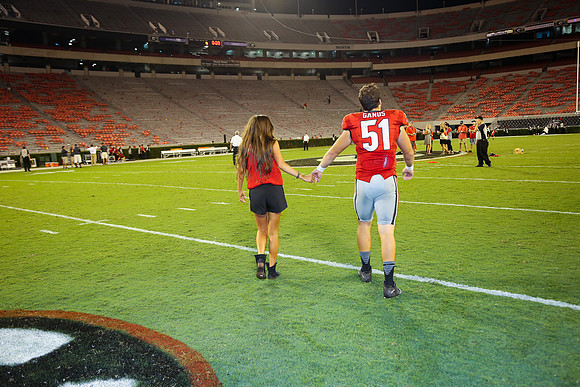 Jake's Proposal to Peyton After the Game by Blane Marable Photog