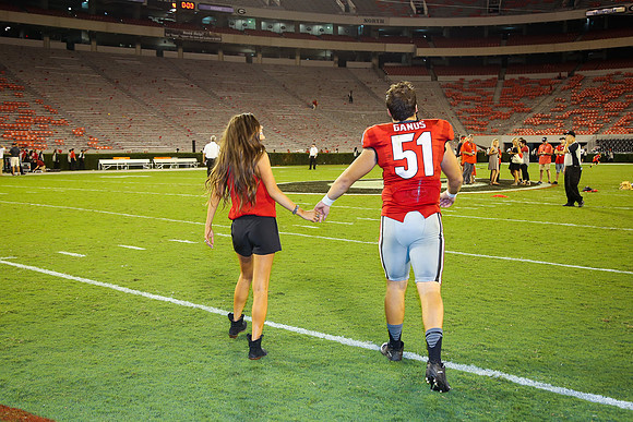 Jake's Proposal to Peyton After the Game by Blane Marable Photog