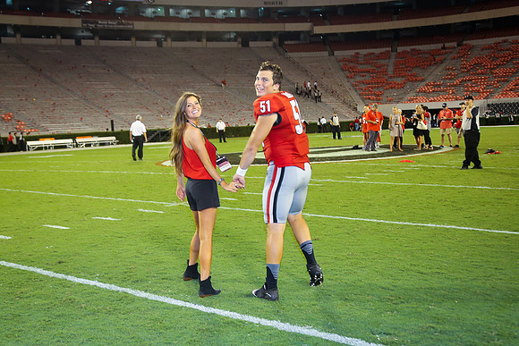 Jake's Proposal to Peyton After the Game by Blane Marable Photog