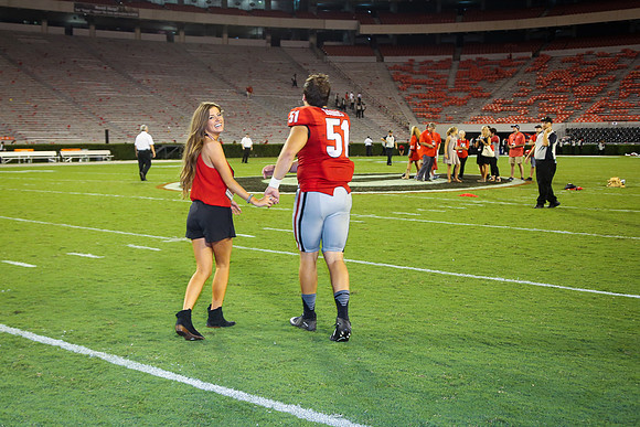 Jake's Proposal to Peyton After the Game by Blane Marable Photog