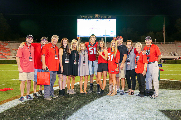 Jake's Proposal to Peyton After the Game by Blane Marable Photog