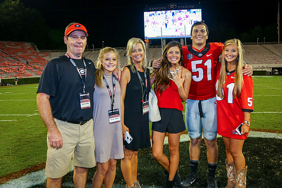 Jake's Proposal to Peyton After the Game by Blane Marable Photog