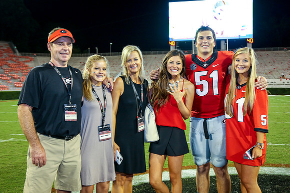 Jake's Proposal to Peyton After the Game by Blane Marable Photog