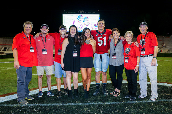 Jake's Proposal to Peyton After the Game by Blane Marable Photog