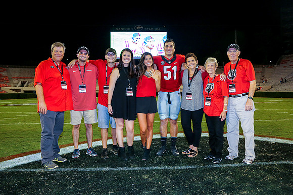 Jake's Proposal to Peyton After the Game by Blane Marable Photog