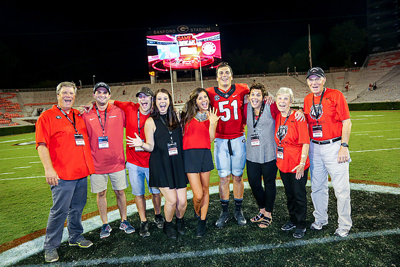 Jake's Proposal to Peyton After the Game by Blane Marable Photog