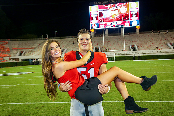 Jake's Proposal to Peyton After the Game by Blane Marable Photog