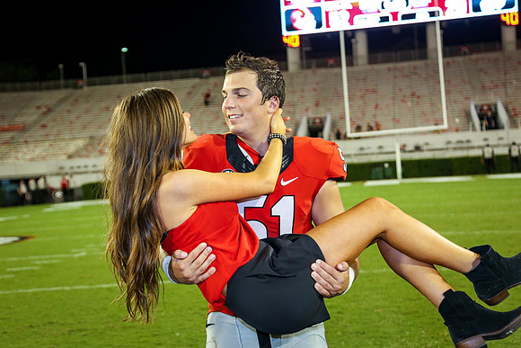 Jake's Proposal to Peyton After the Game by Blane Marable Photog