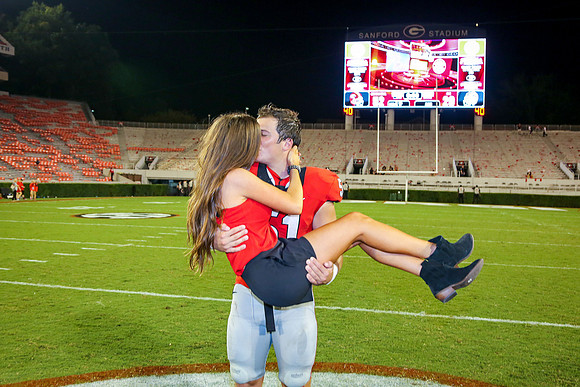 Jake's Proposal to Peyton After the Game by Blane Marable Photog