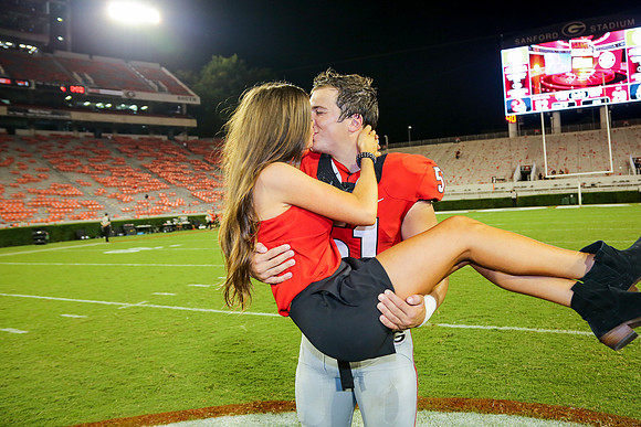 Jake's Proposal to Peyton After the Game by Blane Marable Photog