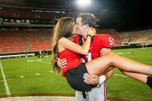 Jake's Proposal to Peyton After the Game by Blane Marable Photog