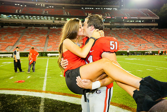 Jake's Proposal to Peyton After the Game by Blane Marable Photog