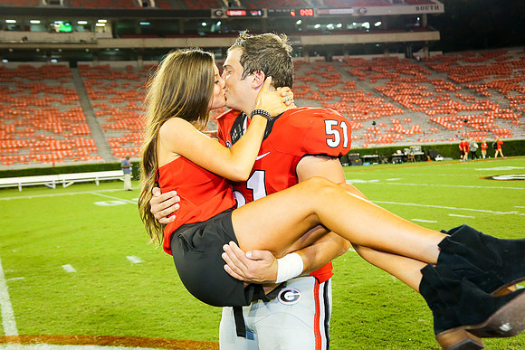 Jake's Proposal to Peyton After the Game by Blane Marable Photog