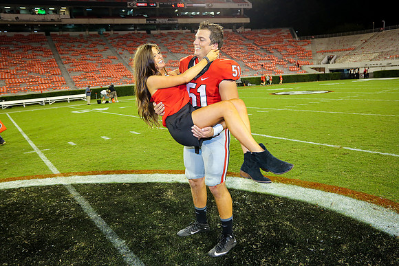 Jake's Proposal to Peyton After the Game by Blane Marable Photog