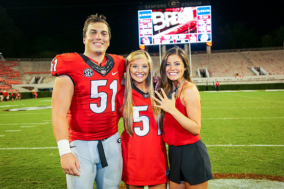 Jake's Proposal to Peyton After the Game by Blane Marable Photog
