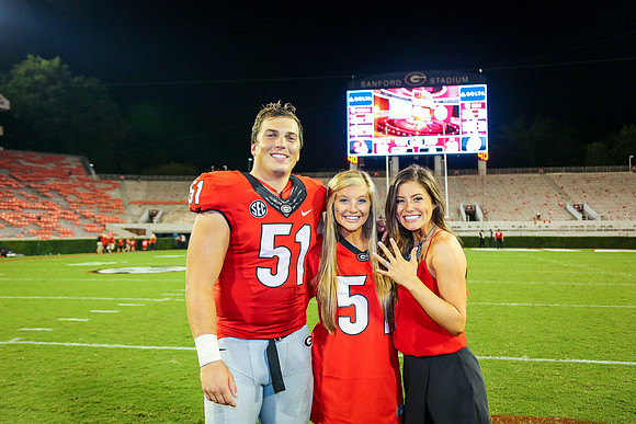 Jake's Proposal to Peyton After the Game by Blane Marable Photog