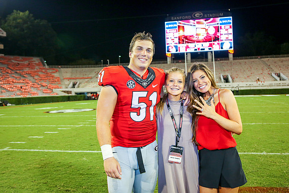 Jake's Proposal to Peyton After the Game by Blane Marable Photog