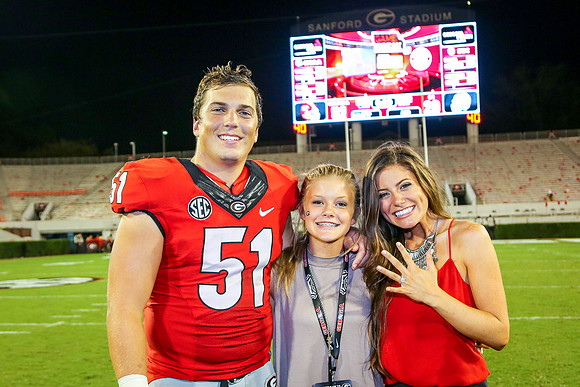 Jake's Proposal to Peyton After the Game by Blane Marable Photog