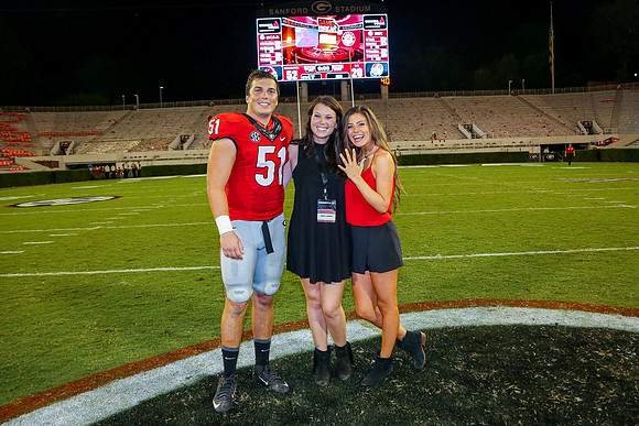 Jake's Proposal to Peyton After the Game by Blane Marable Photog