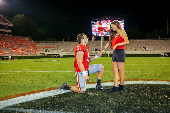 Jake's Proposal to Peyton After the Game by Blane Marable Photog