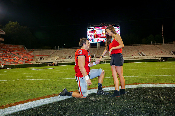 Jake's Proposal to Peyton After the Game by Blane Marable Photog