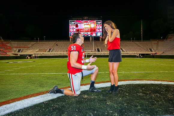 Jake's Proposal to Peyton After the Game by Blane Marable Photog